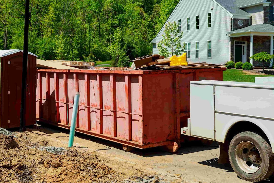 garbage-containers-near-the-new-home-red-container